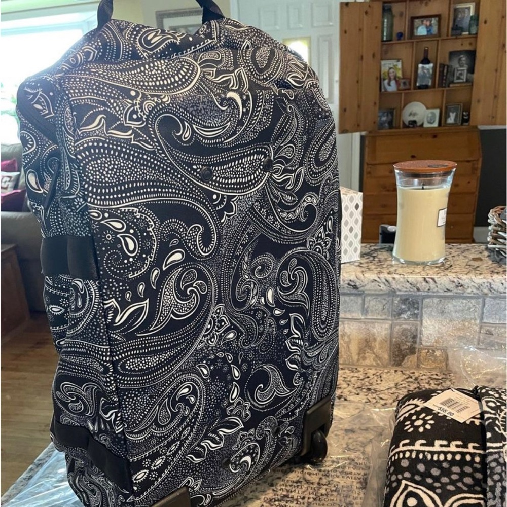 NWT Vera Bradley lighten up, wheeled carry-on and fleece travel blanket.